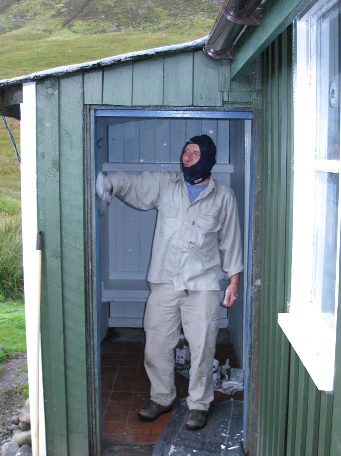 01 Quinton painting the front door