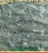 01 Decorated slate in a Mani Wall