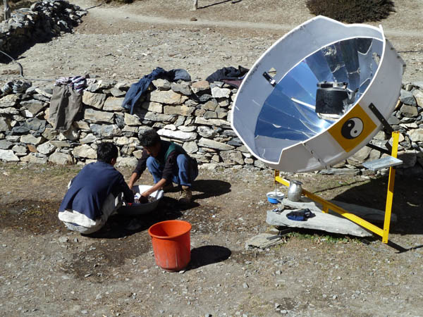 16  Arjun and Rajendra doing the washing by a solar heater